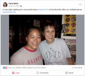 Screenshot from a Facebook post with Amanda Chin and Carol Baird in softball jerseys.